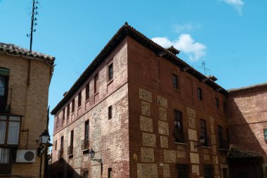 Toledo, Espaa. April 29, 2022: Facade of the cathedral of Toledo with blue sky.