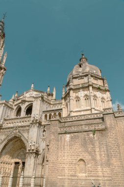 Toledo, Espaa. April 29, 2022: Santa Iglesia Catedral Primada de Toledo with beautiful blue sky.