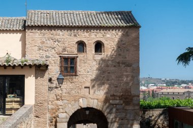 Toledo, Spain. April 5, 2022: Walls and fortresses of Toledo with beautiful blue sky.