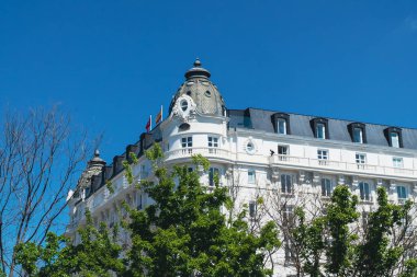 Madrid, Spain. April 5, 2022: Architecture and facade of the city with blue sky.