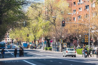 Madrid, Spain. April 6, 2022: architecture and facade of houses with beautiful blue sky.