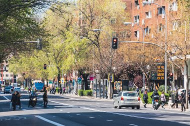 Madrid, Spain. April 6, 2022: architecture and facade of houses with beautiful blue sky.