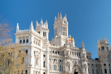 Madrid, Spain. April 6, 2022: Communications palace and cibeles fountain.