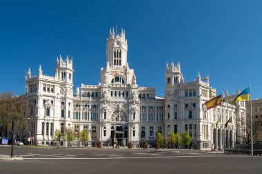 Madrid, Spain. April 6, 2022: Communications palace and cibeles fountain.