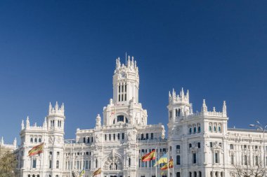 Madrid, Spain. April 6, 2022: Communications palace and cibeles fountain.