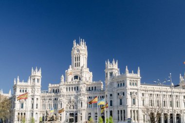 Madrid, Spain. April 6, 2022: Communications palace and cibeles fountain.
