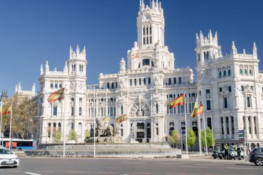 Madrid, Spain. April 6, 2022: Communications palace and cibeles fountain.
