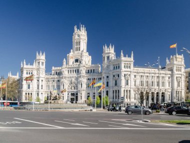Madrid, Spain. April 6, 2022: Communications palace and cibeles fountain.