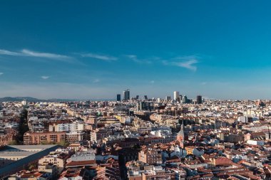 Madrid, Spain. April 6, 2022: Panoramic city landscape with beautiful blue sky.