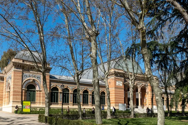 Madrid, Spain. April 6, 2022: Crystal palace facade and architecture with blue sky