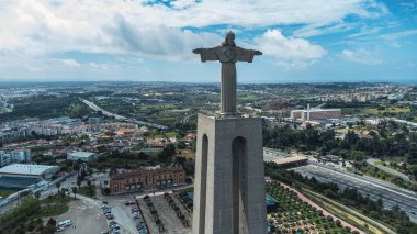 Lisbon, Portugal. April 11, 2022: Panoramic landscape with a view of the Tagus river and 25 de Abril bridge.