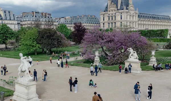 stock image Paris, France. April 23, 2022: Louvre museum and Tuileries garden.