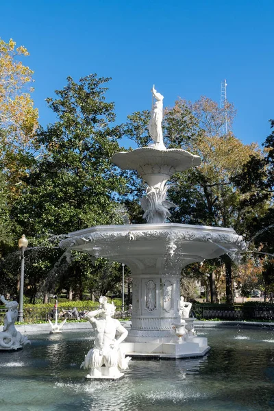 Savannah, Georgia, Usa. December 2, 2022: Fountain with blue sky in forsyth park.