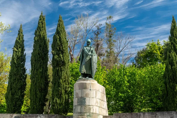 stock image Guimaraes, Portugal. April 14, 2022: Alonso Henriques sculpture with blue sky.