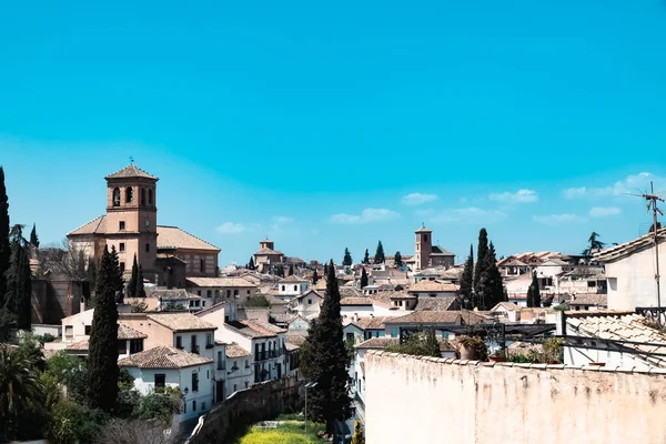 stock image Granada,Spain. April 14, 2022: Albaicin neighborhood San Ildefonso Cathedral with blue sky.