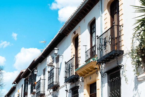 Granada,Spain. April 14, 2022: Albaicin neighborhood architecture and blue sky. Panoramic landscape of the neighborhood.