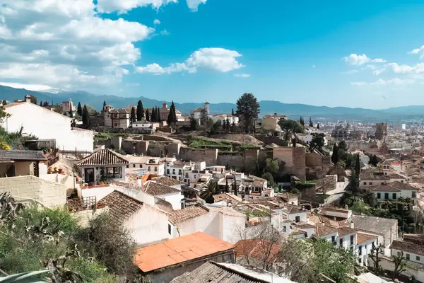 stock image Granada,Spain. April 14, 2022:  Albaicin neighborhood architecture and blue sky. Panoramic landscape of the neighborhood.