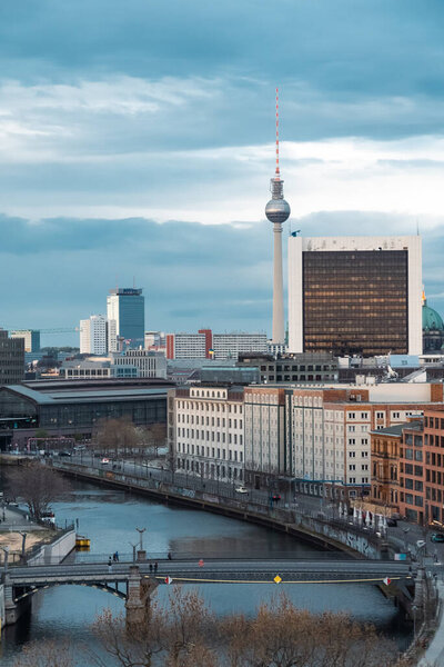 Berlin, Germany: April 20, 2022: Spree river panorama with bridge.