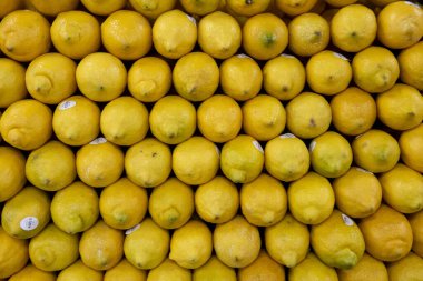 Yeşil limon ve doku yığınlarıyla arka plan.