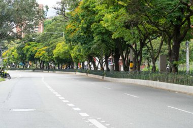 Medellin, Antioquia, Colombia. July 20, 2020: Poblado avenue and green corridor in the city.