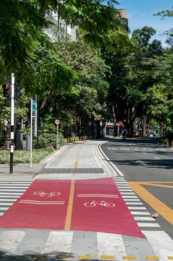 Medellin, Antioquia, Colombia. July 20, 2020: La Playa avenue and bike lane in quarantine days.