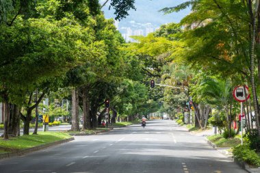 Medellin, Antioquia, Colombia. July 20, 2020: Nutibara avenue with green corridor in quarantine days.