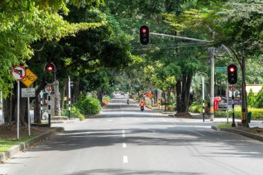 Medellin, Antioquia, Colombia. July 20, 2020: Nutibara avenue with green corridor in quarantine days.
