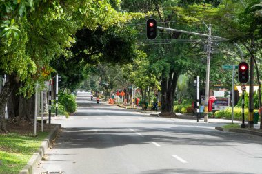 Medellin, Antioquia, Colombia. July 20, 2020: Nutibara avenue with green corridor in quarantine days.