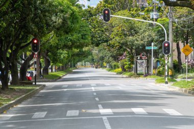Medellin, Antioquia, Colombia. July 20, 2020: Nutibara avenue with green corridor in quarantine days.