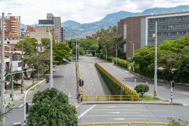 Medellin, Antioquia, Colombia. July 20, 2020: Nutibara avenue with green corridor in quarantine days.