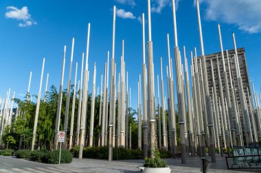 Medellin, Antioquia, Colombia. July 18, 2020: Light structures to illuminate the square at night and blue sky.
