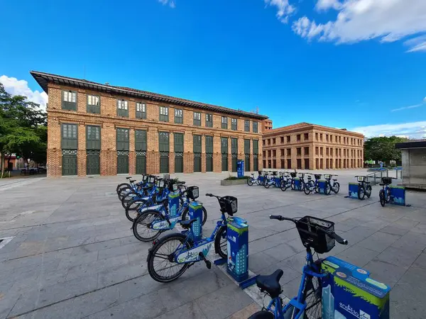 stock image Medellin, Antioquia, Colombia. July 17, 2020: Carre Vasquez building and Metro bike with a beautiful blue afternoon.