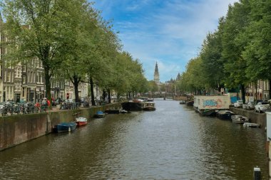 Amsterdam, Holland. September 28, 2019: Beautiful landscape with architecture and canals in Amsterdam, Holland. clipart