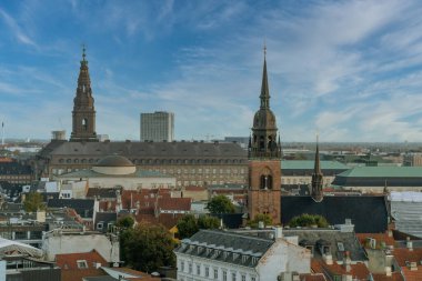 Copenhagen, Denmark. September 27, 2019: Copenhague, Denmark. September 28, 2019: Panoramic landscape of the city and its architecture with sky. clipart