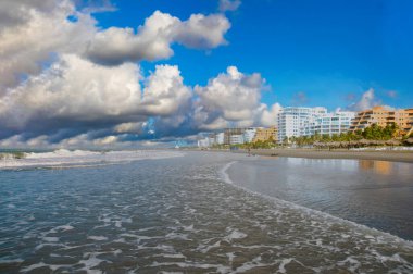 Landscape on La Boquilla beach with beautiful blue sky and sea view.umbrellas to rest.