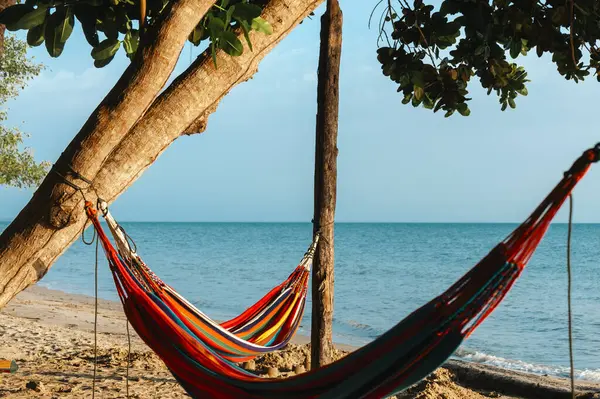 stock image landscape on the beach with hammock to rest. Gulf of Morrosquillo, San Bernardo Archipelago