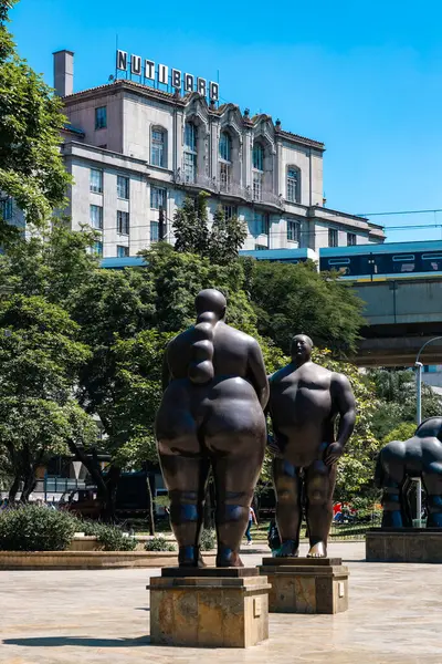 stock image Medellin, Antioquia, Colombia. January 17, 2024: Sculptures in Botero Square and Nutibara Hotel.