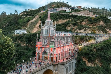 Ipiales, Narino, Colombia. June 26, 2024: Sanctuary of Our Lady of the Rosary of Las Lajas illuminated with its colorful lights. clipart