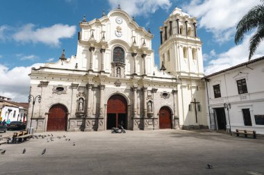 Popayan, Cauca, Colombia. April 30, 2024: Church of San Francisco with white facade and blue sky. clipart