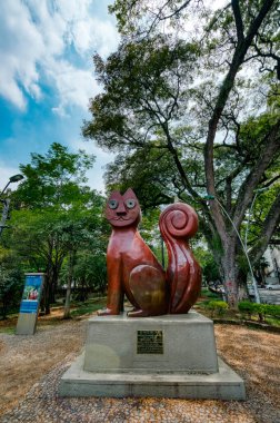 Cali, Valle del Cauca, Colombia. April 23, 2024: El Gato del Rio Monument in the Cat Park. clipart