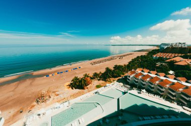 Cartagena, Bolivar, Colombia. January 17, 2013: Panoramic photo with sea view and blue sky.Architecture of the area. clipart