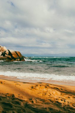 Beautiful landscape with ocean view and blue sky on the beaches of Tayrona Park. Santa Marta, Colombia. clipart