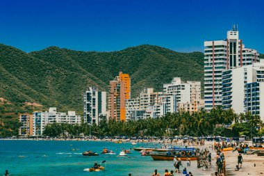 Santa Marta, Magdalena, Colombia. September 16, 2024: Landscape with sea view and buildings on El Roadero beach clipart