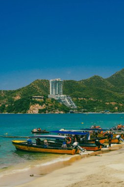 Santa Marta, Magdalena, Colombia. September 16, 2024: Landscape with sea view and buildings on El Roadero beach clipart