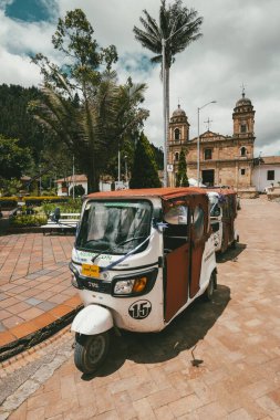 Nemocon, Cundinamarca, Colombia. July 2, 2021: Facade of San Francisco de Ass church and blue sky.