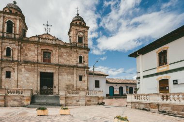 Nemocon, Cundinamarca, Colombia. July 2, 2021: Facade of San Francisco de Ass church and blue sky.