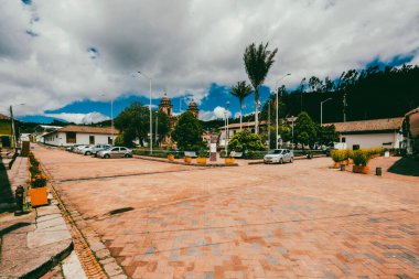 Nemocon, Cundinamarca, Colombia. July 2, 2021: Facade of San Francisco de Ass church and blue sky.