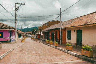 Nemocon, Cundinamarca, Colombia. July 2, 2021: Facade of San Francisco de Ass church and blue sky.