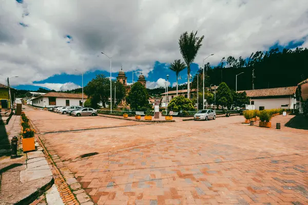 Nemocon, Cundinamarca, Colombia. July 2, 2021: Facade of San Francisco de Ass church and blue sky.