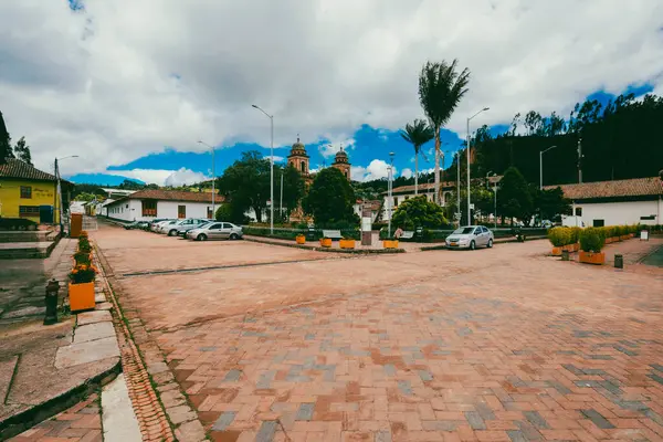 Nemocon, Cundinamarca, Colombia. July 2, 2021: Facade of San Francisco de Ass church and blue sky.